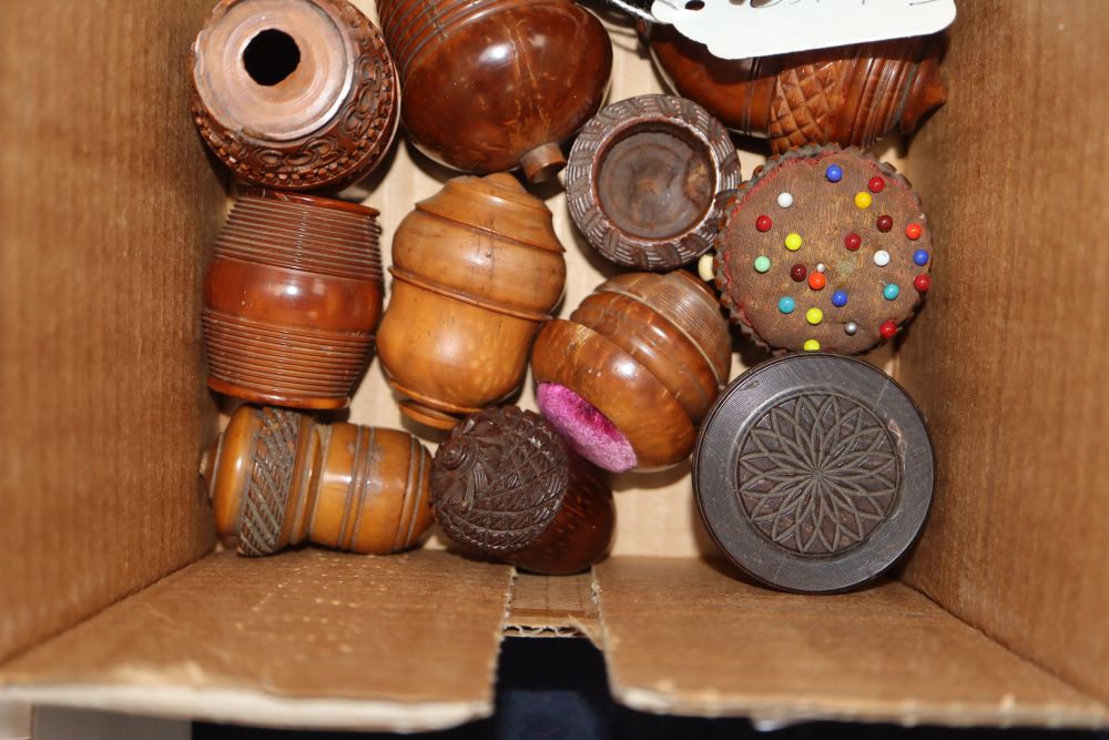 A group of 19th century coquilla nut sewing, games related etc barrel, basket and acorn shaped containers